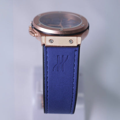 Hublot Men's Watch Blue Straps and Blue Dial with gold ring.