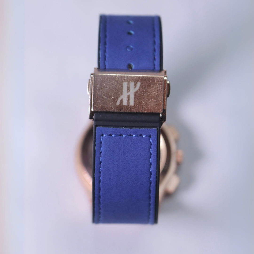 Hublot Men's Watch Blue Straps and Blue Dial with gold ring.